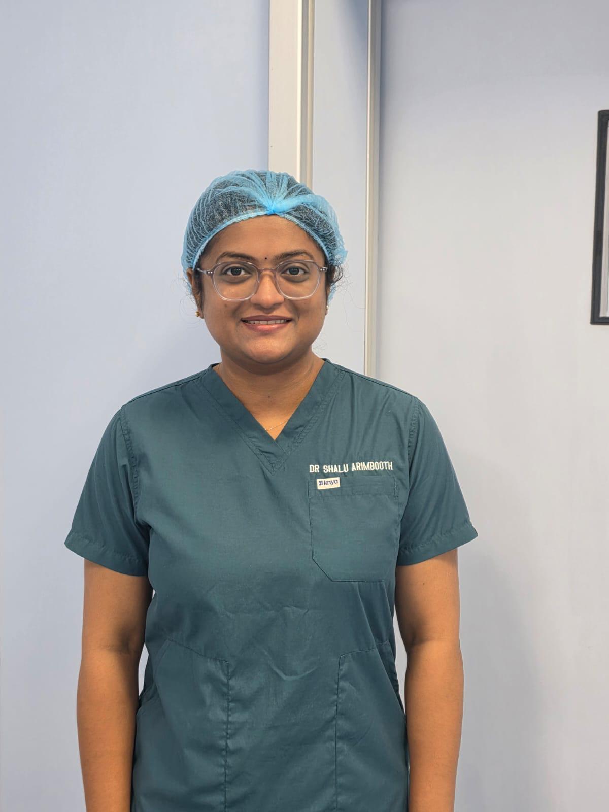 Dr. Shalu in scrubs